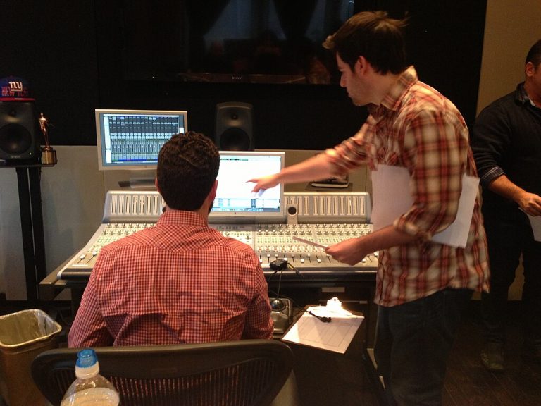 2 male audio engineers at work